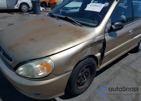 2002 Kia Rio Cinco из США, поврежденный, VIN KNADC163926066740